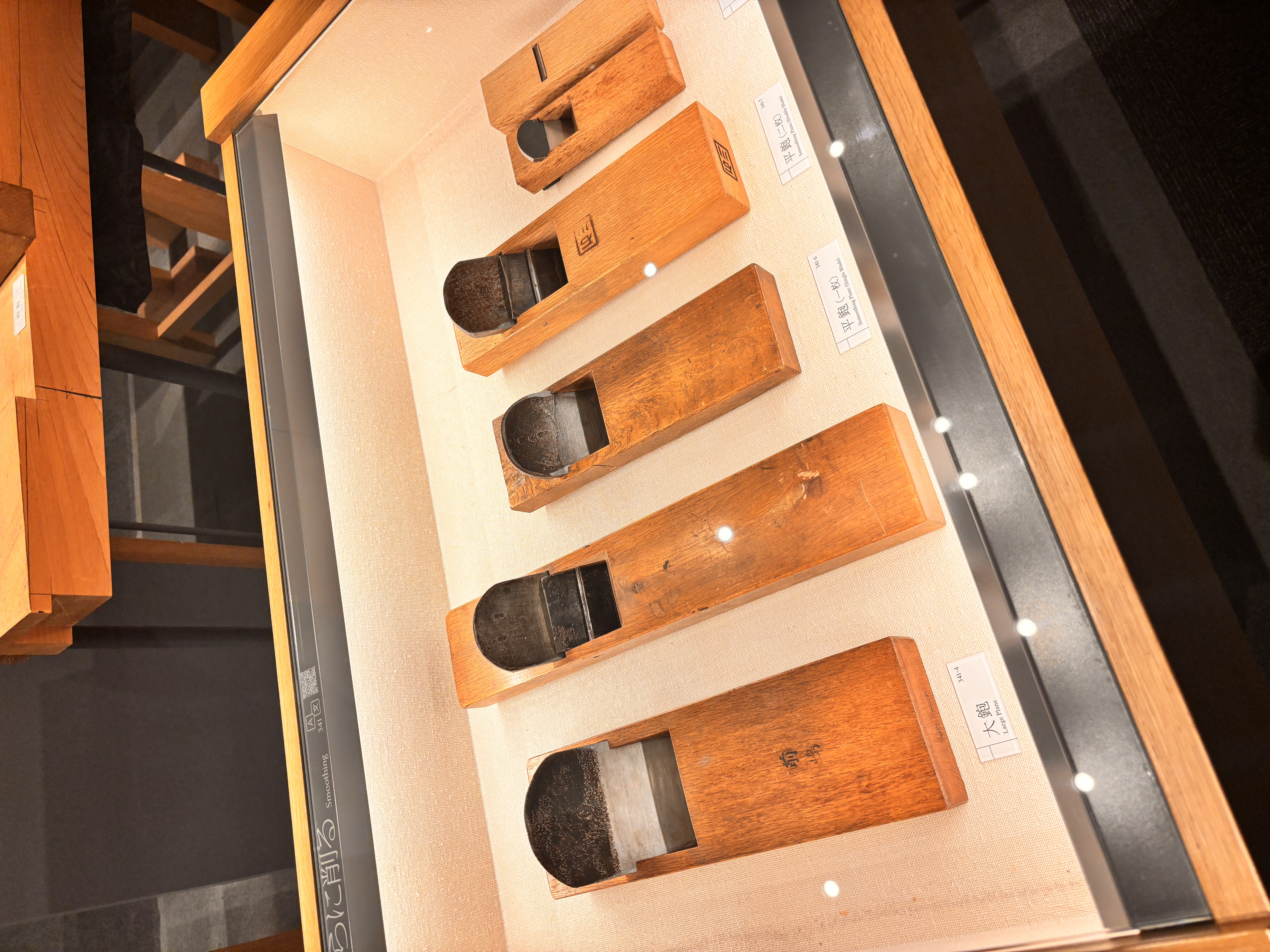 Various types of kanna (hand planes) on display