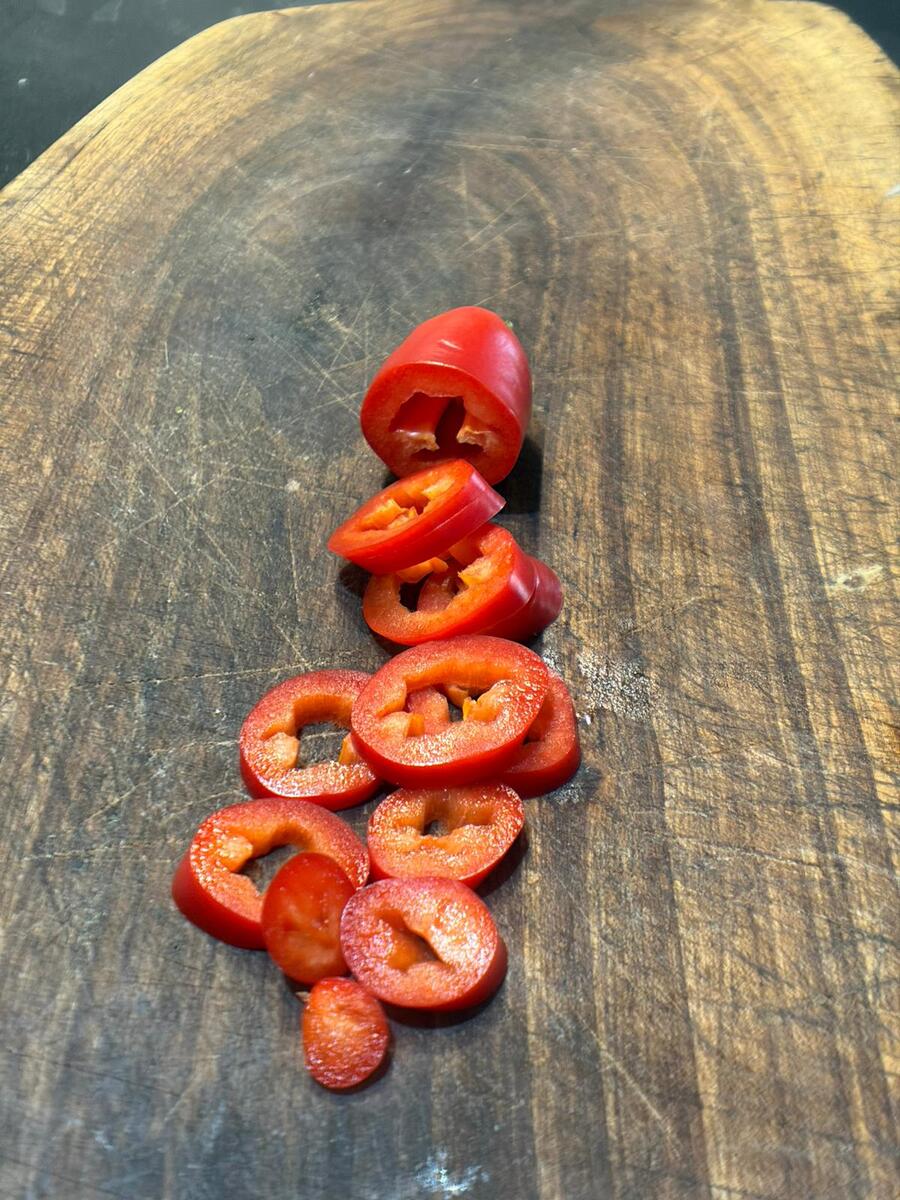 Sliced red chili rings in close-up
